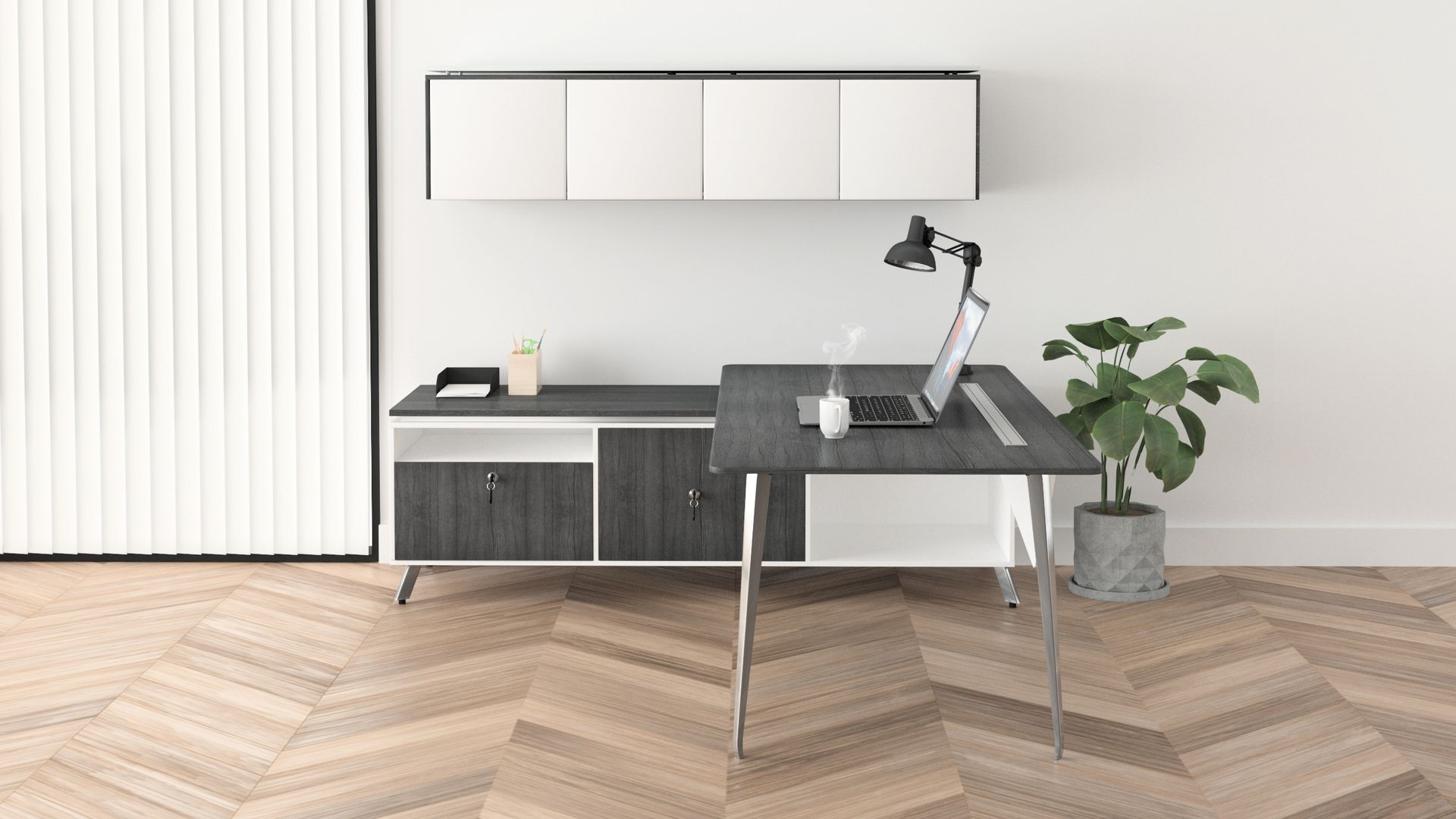 Modern office desk with laptop, lamp, and plant; overhead storage cabinets, herringbone wood floor.