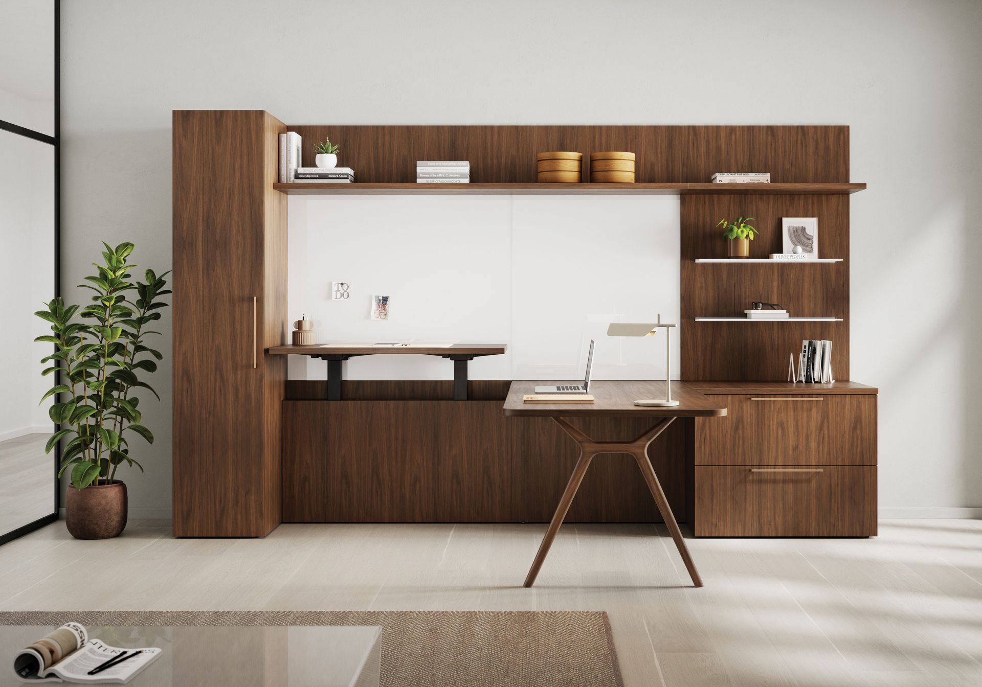 Modern office desk with built-in storage; walnut wood, shelves, laptop, lamp, houseplant.