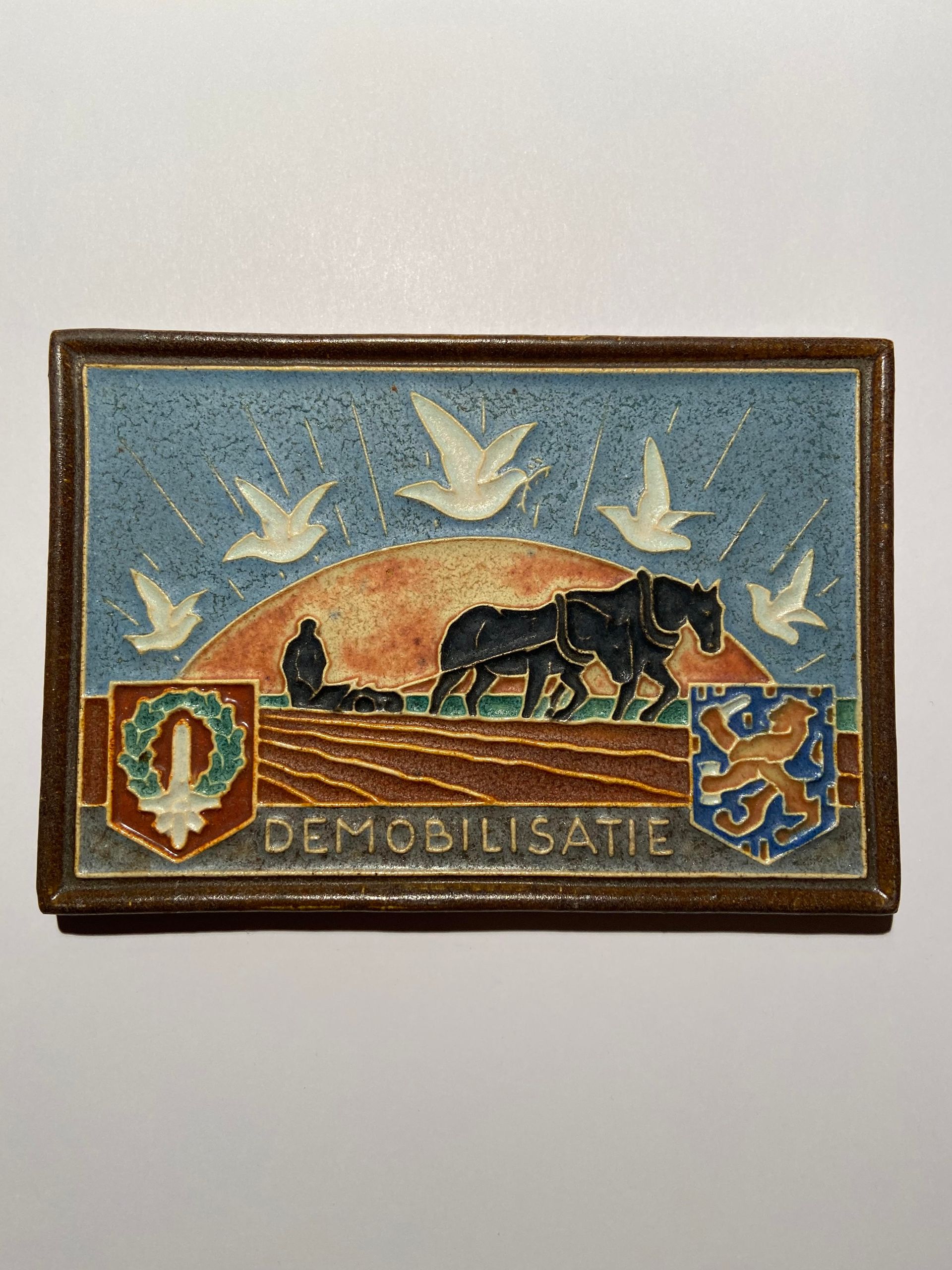 PFtile Porceleyne Fles Delft Cloisonne tile war and peace.