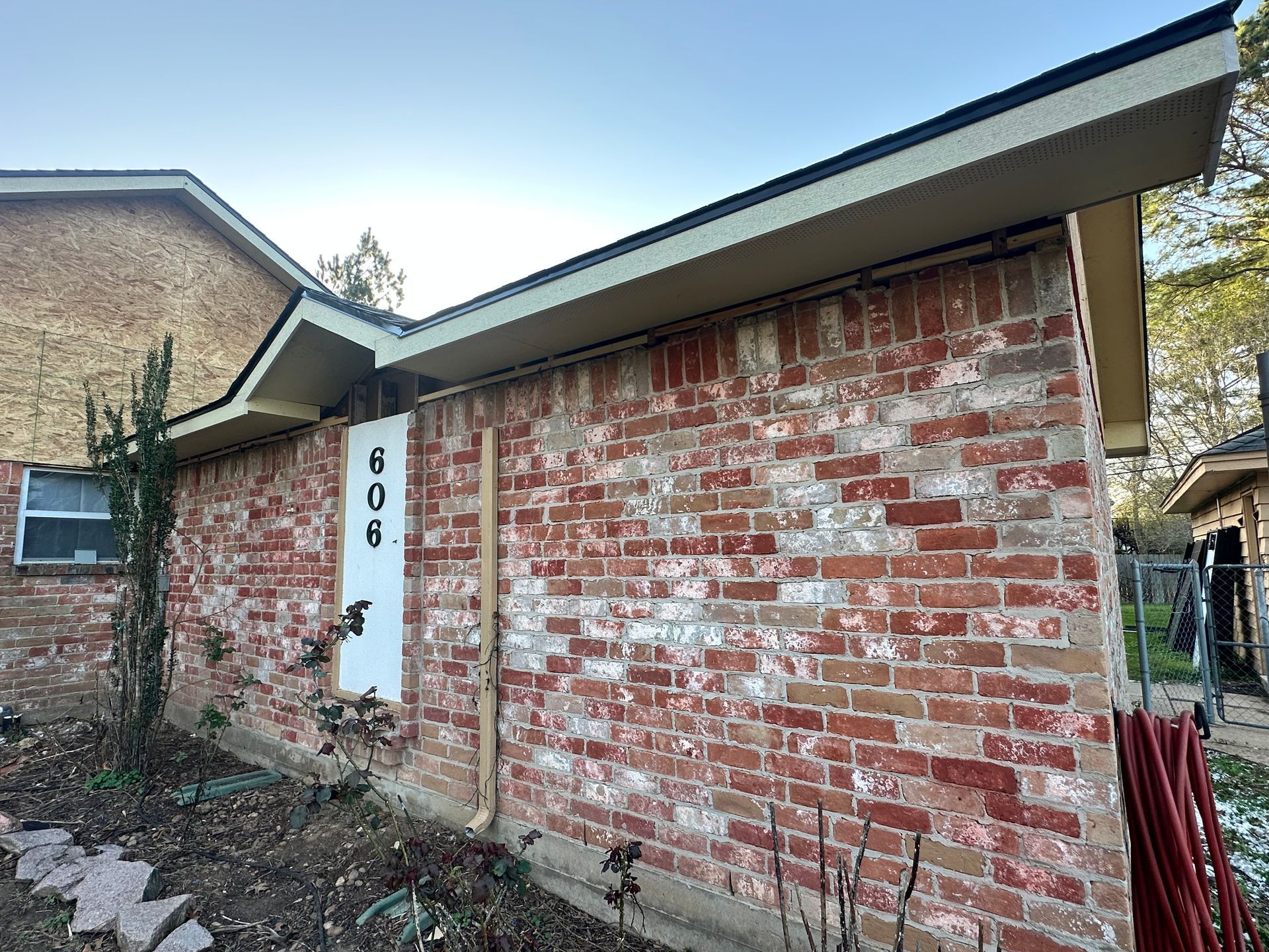 Brick building exterior with address 