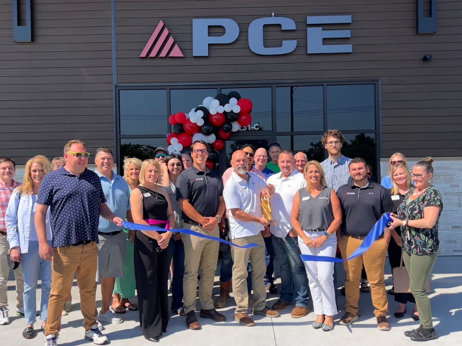 Ribbon Cutting Ceremony at PCE Construction’s New Lake Ozark, MO Office. We Are Commercial Builders.