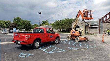 Construction Workers in Front of Red Truck — Fort Wayne, IN — Strebig Construction, Inc.