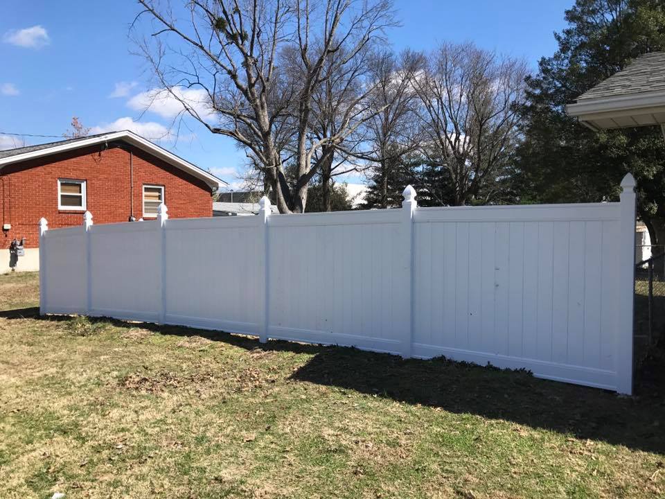 Long Wooden Fence — Fairdale, KY — Jones & Scott Fence Inc