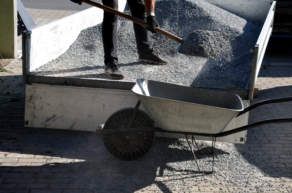 Unloading Gravel Using Shovel — Bend, OR — Del Barber Excavation Inc.