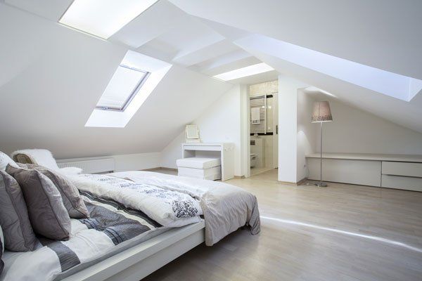 Spacious bedroom in roof space
