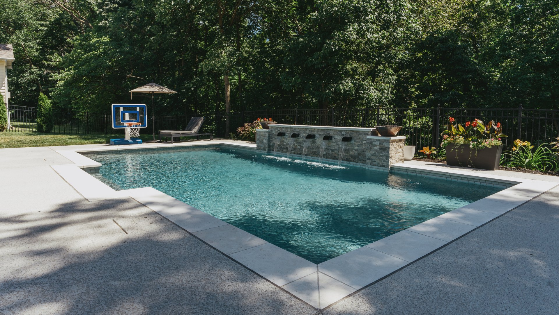 Rectangular pool with scuppers water feature