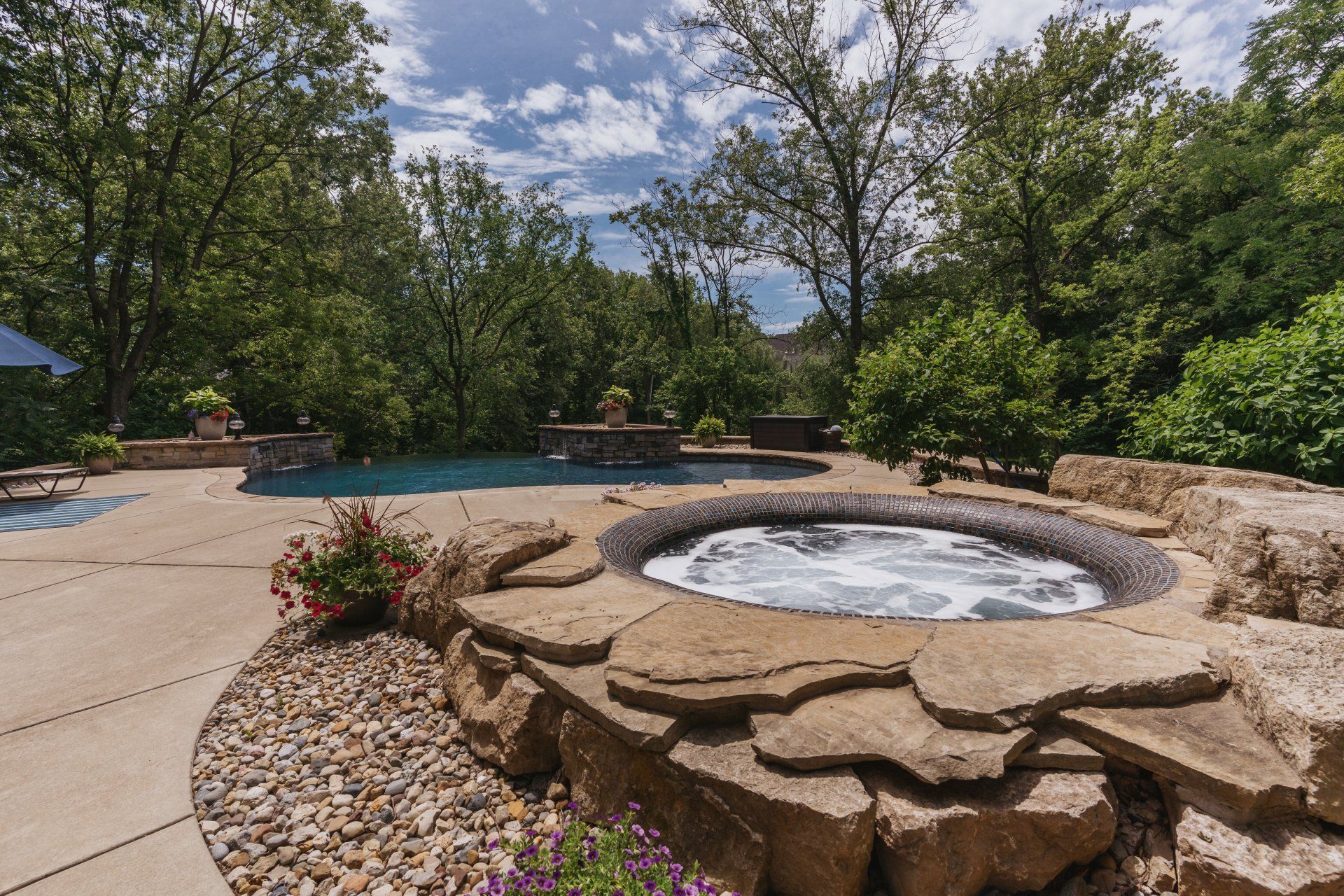 Circular stone spa with jets and bubblers