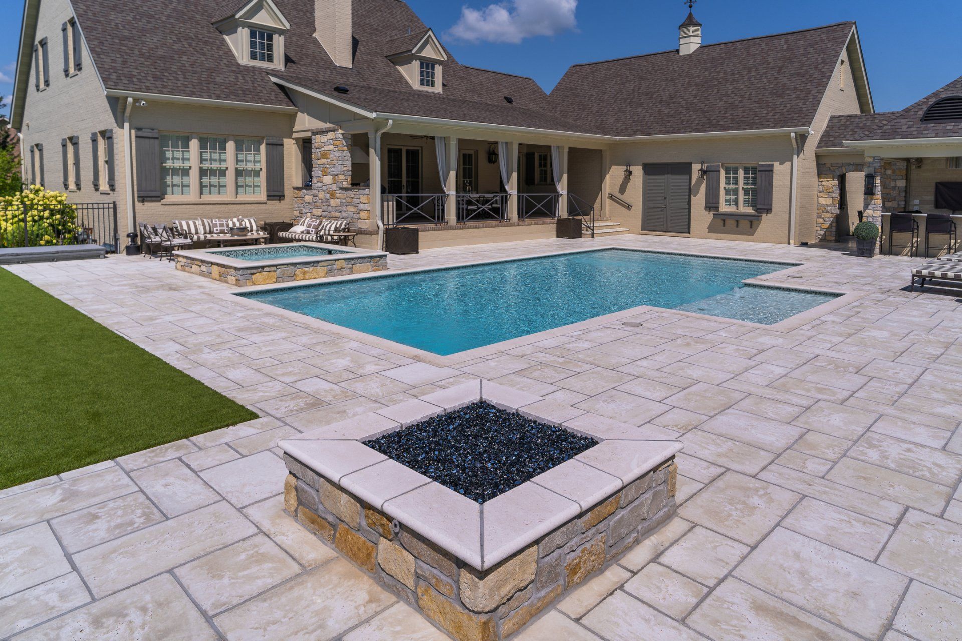 Residential pool in a luxury area with fire pit