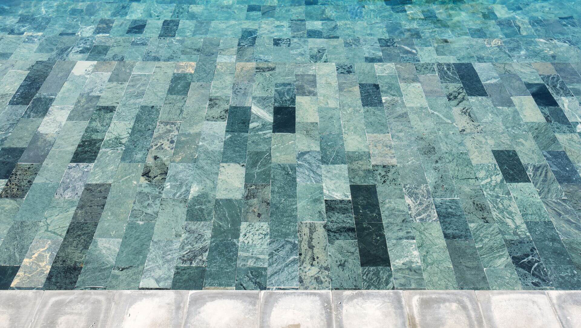 Multi colored pool surface finish