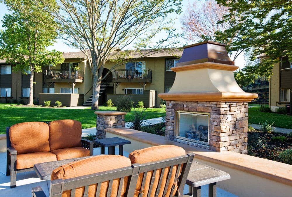 Outdoor wood fireplace with furnitures