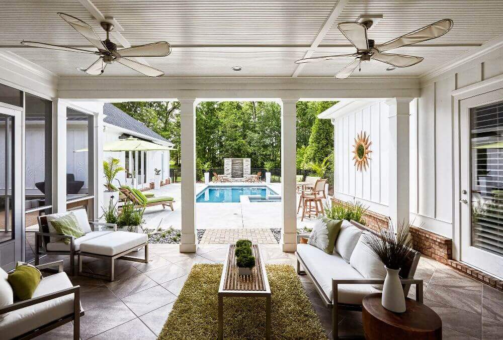 Pool with spa overlooking from the inside of a residential house
