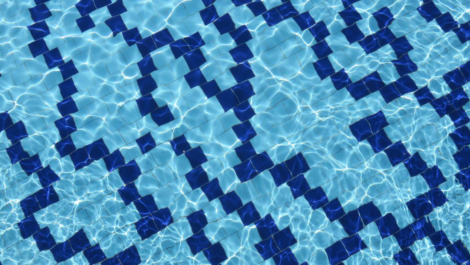 White and blue tiled pool floor