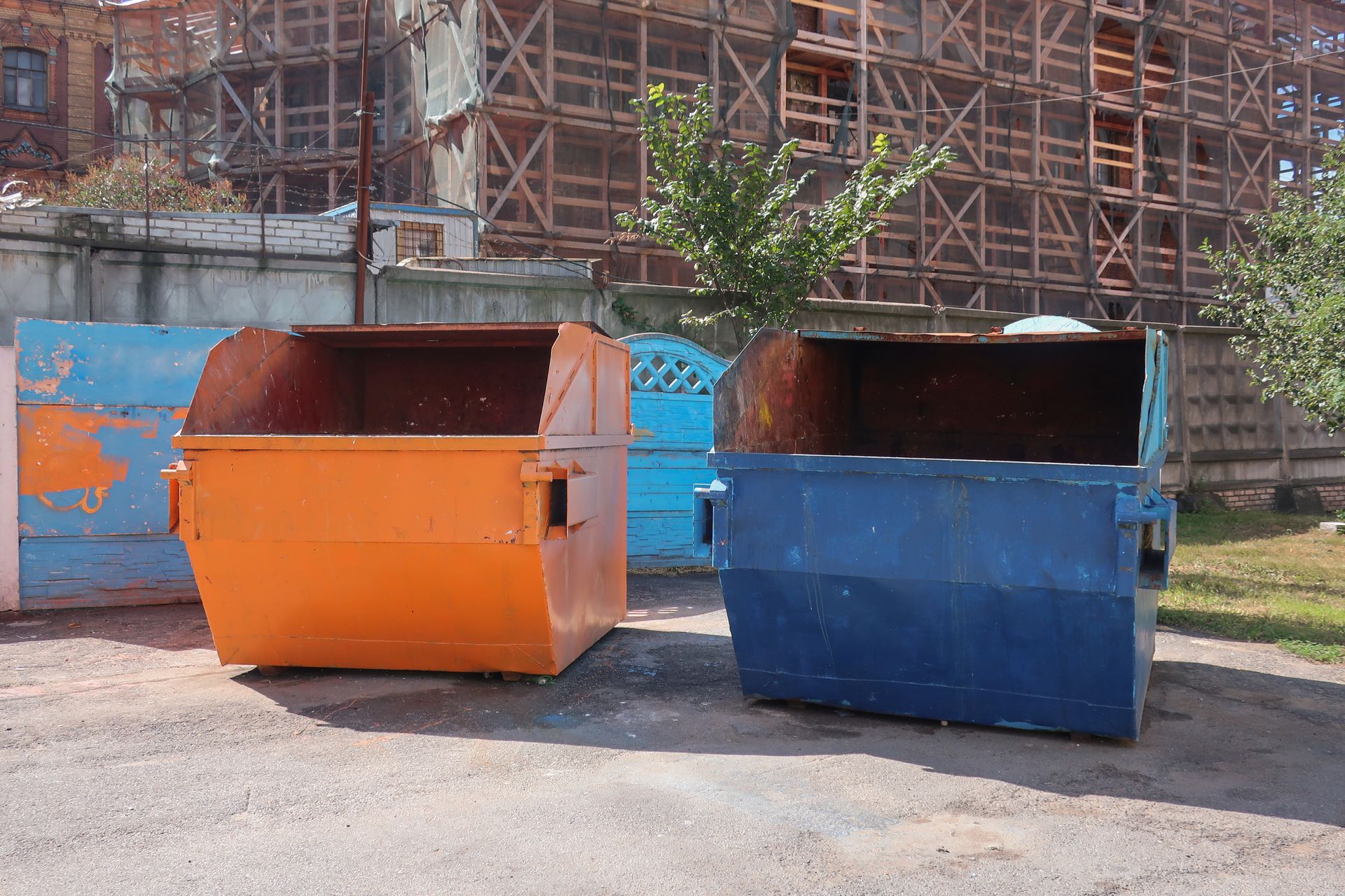 Industrial garbage container on construction site.