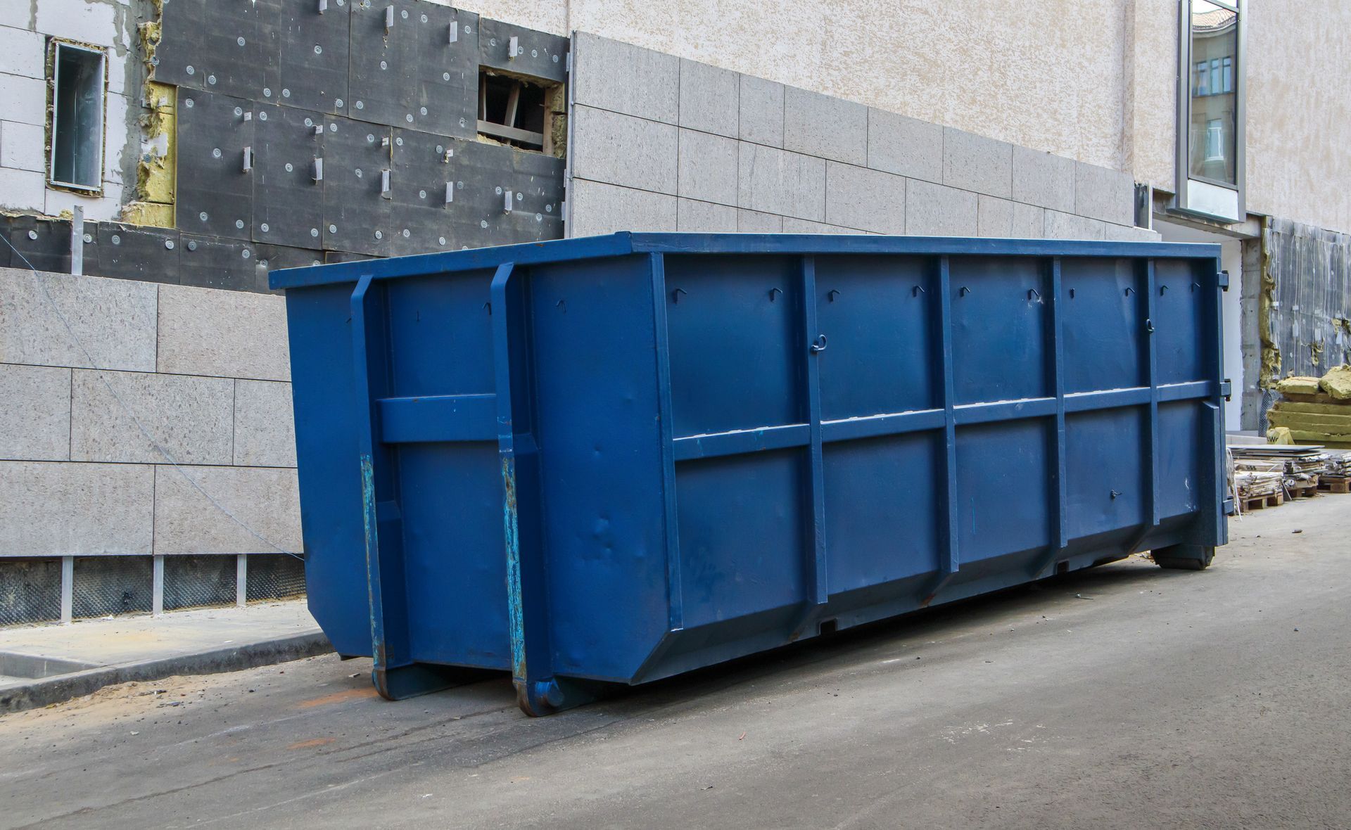 Industrial metal trash container showcasing a rolloff dumpster for outdoor construction waste.