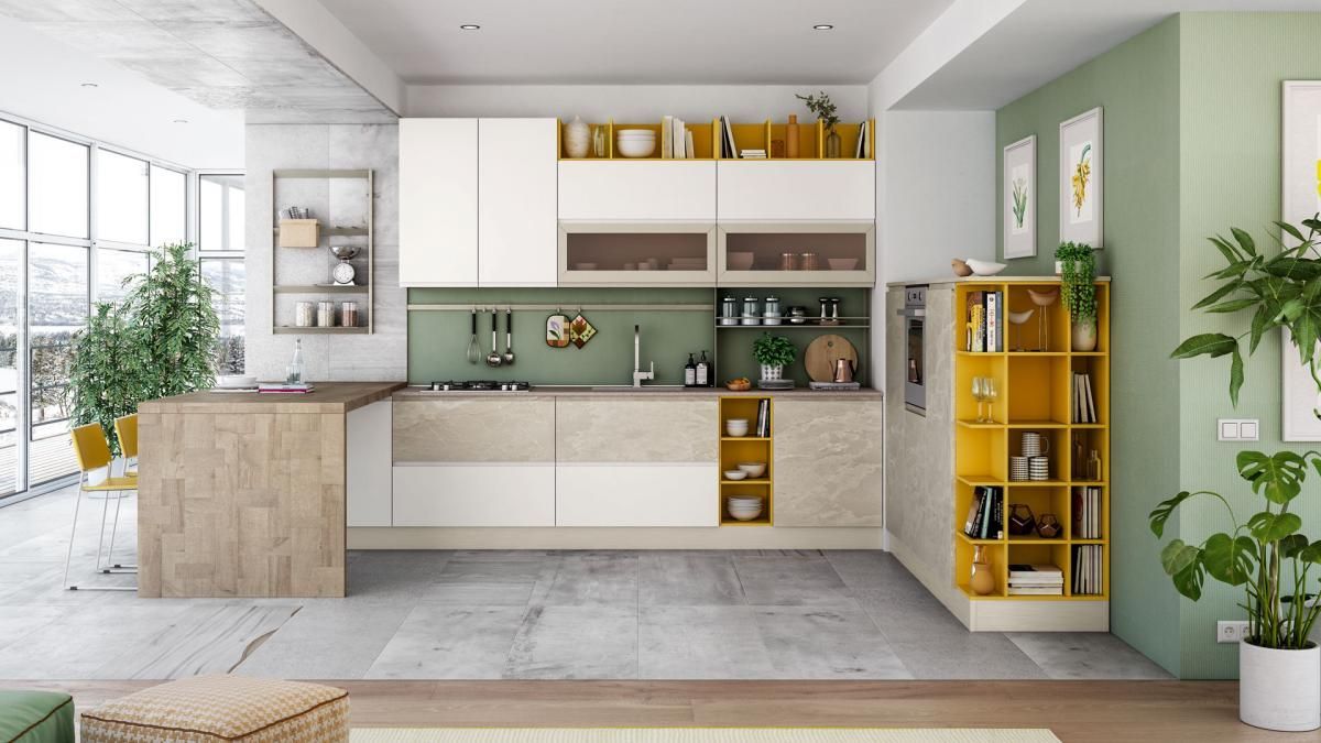 Una cucina con mobili bianchi e scaffali gialli in un soggiorno.