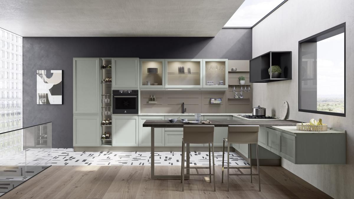Una cucina con una grande isola e sgabelli