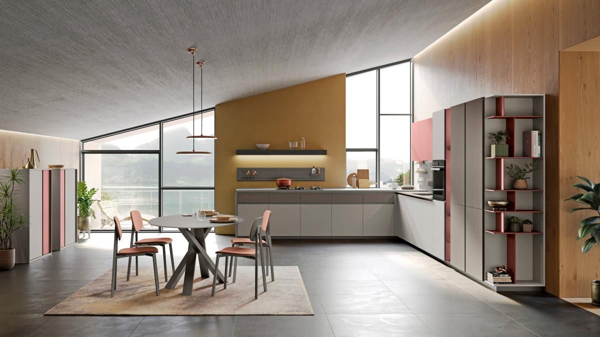 Una cucina con tavolo e sedie