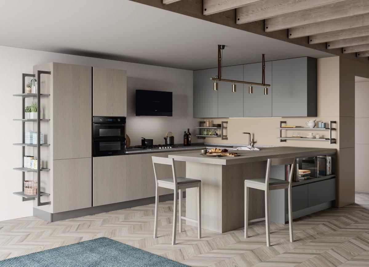 Una cucina con una grande isola e sgabelli