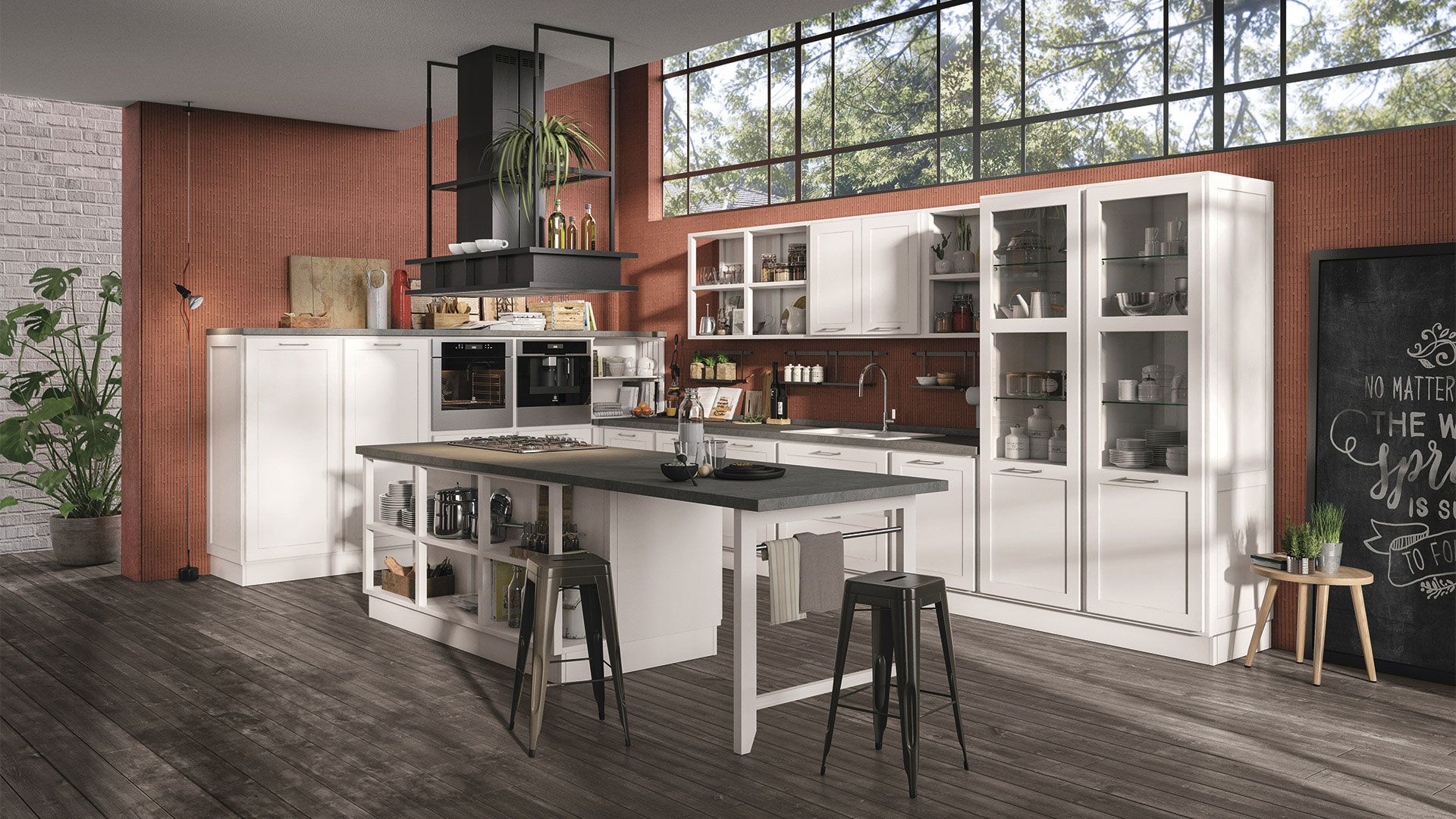 Una cucina con mobili bianchi e una grande isola al centro.