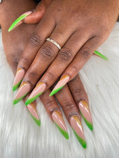 A close up of a woman 's nails with a ring on her finger.