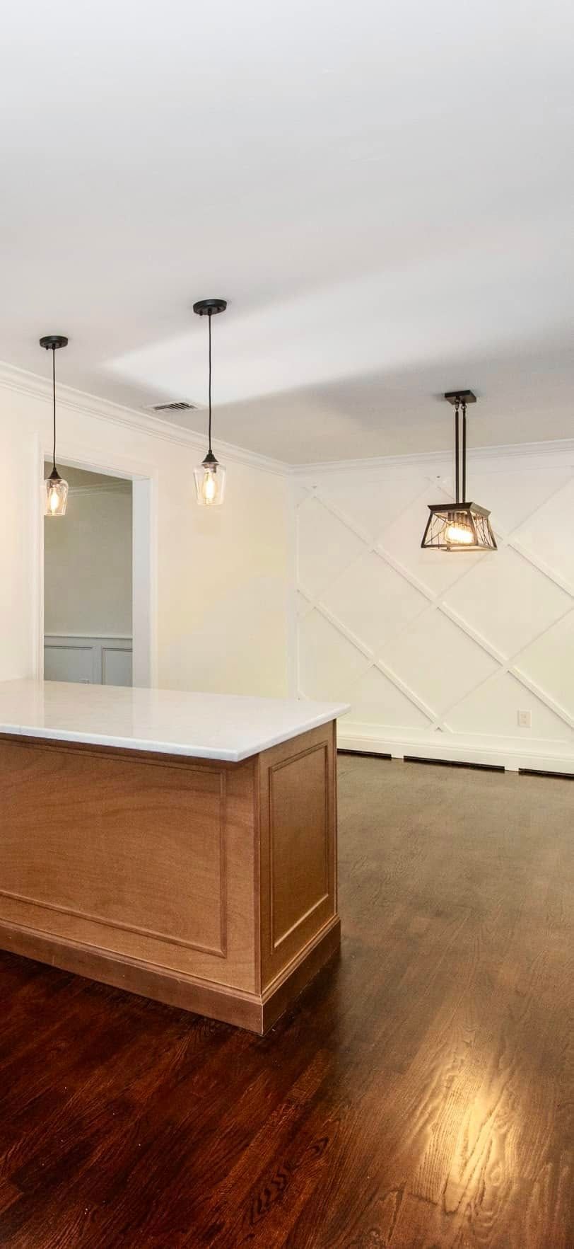 There is a large island in the middle of the room.