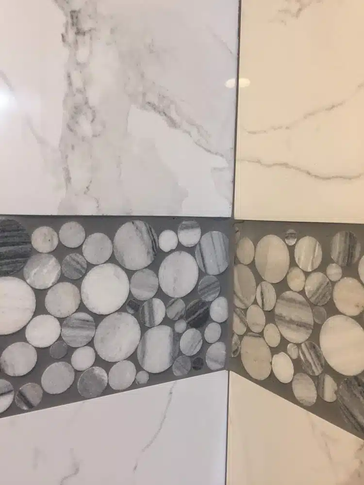 A close up of a tile with circles on it