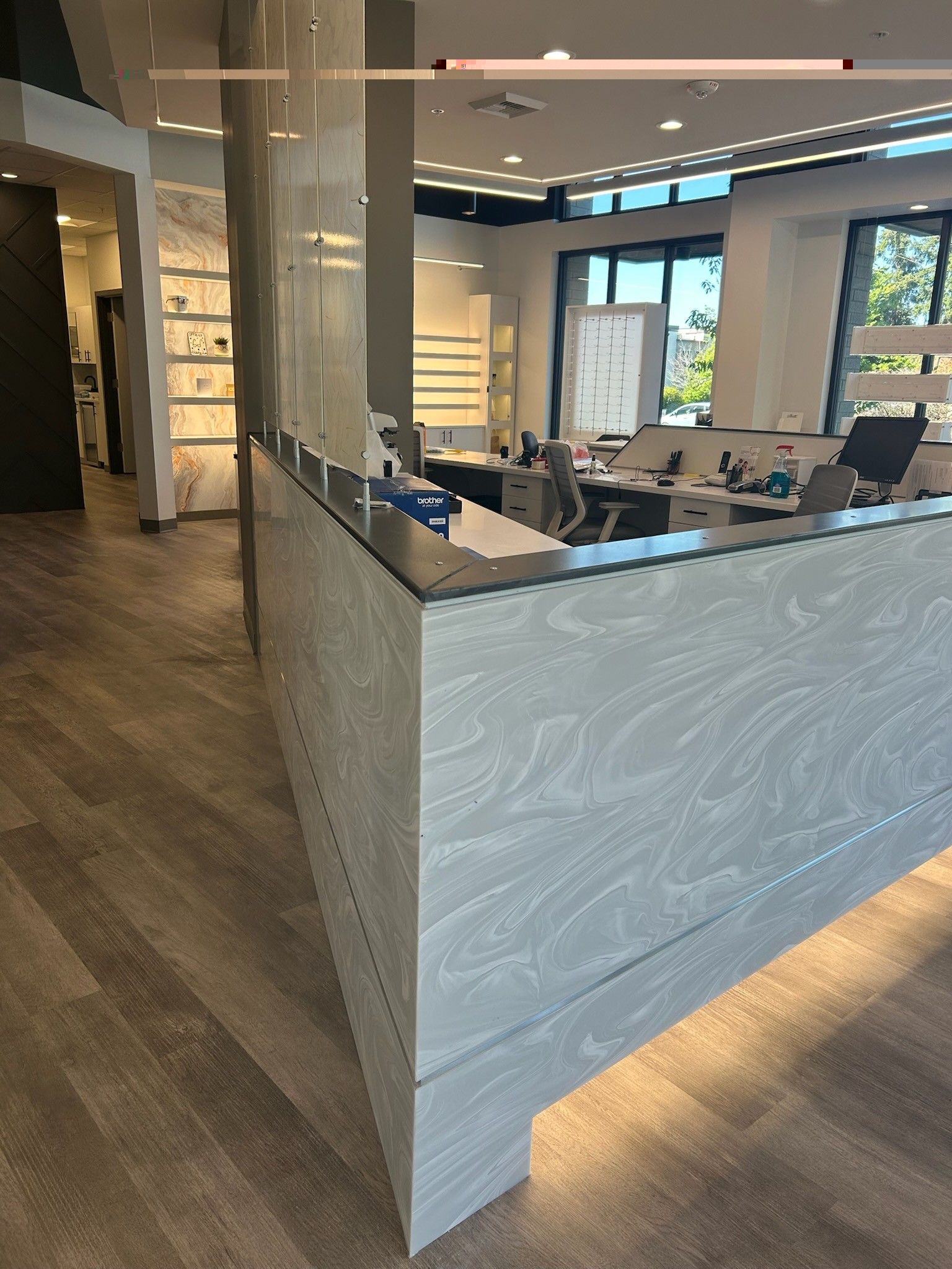 There is a large counter in the middle of the room.