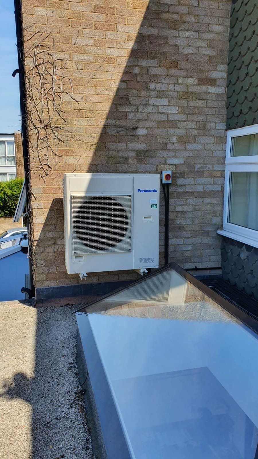 A Panasonic AC unit, external. Side view