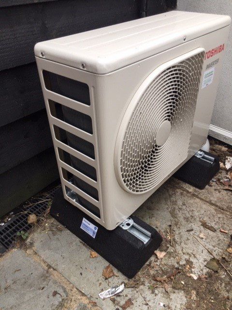 An AC intake outside - side view.