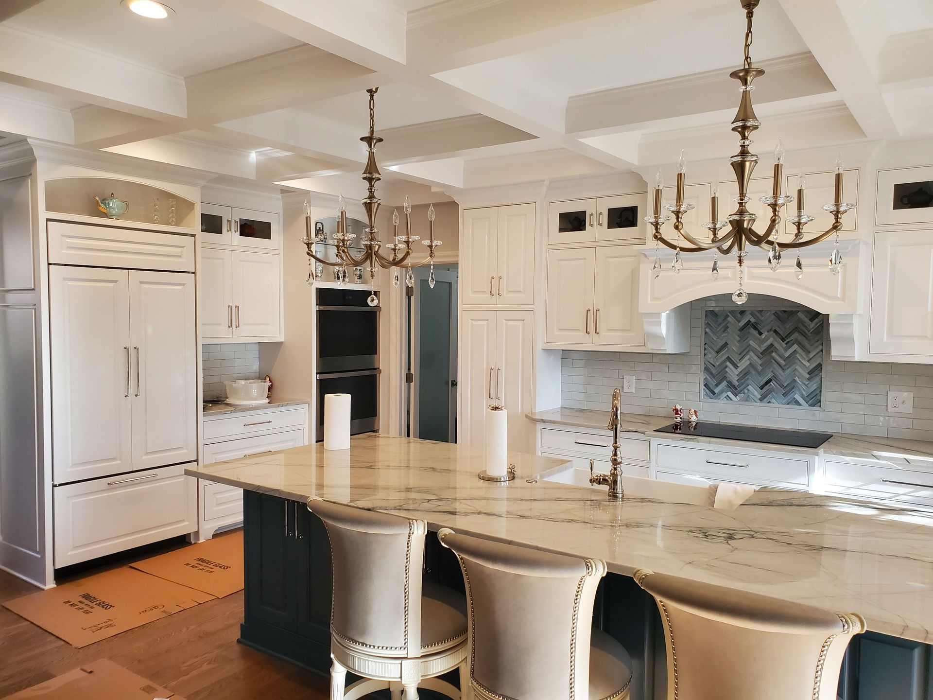 a kitchen with stainless steel appliances and granite counter tops