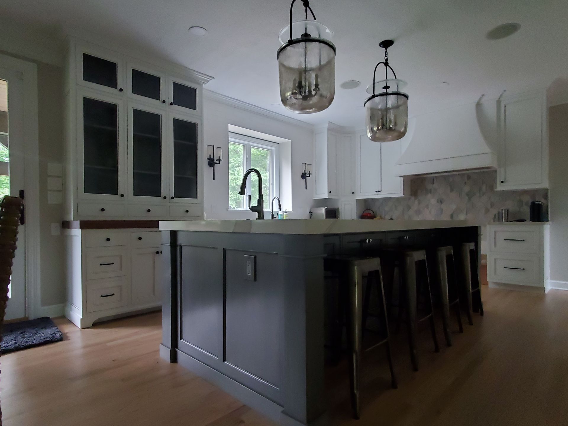 a kitchen with a stove a refrigerator and a microwave shawnee kitchen