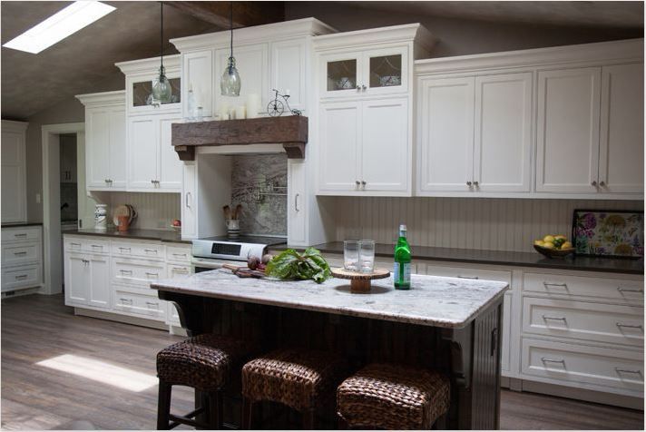 a kitchen with stainless steel appliances and granite countertops

