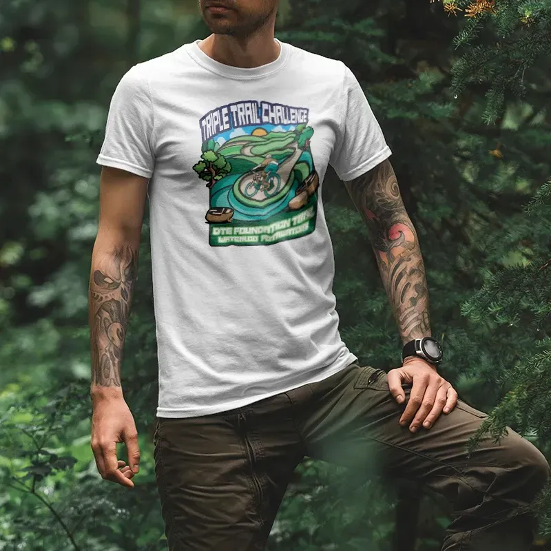 A man wearing a white t-shirt with a frog on it