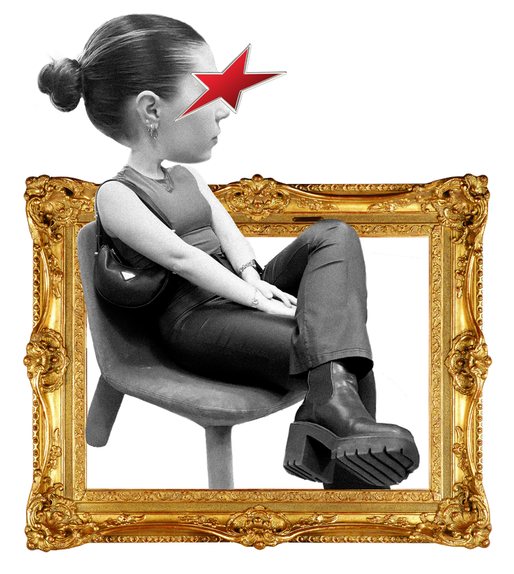 A person with a red star over their eye, sitting in a chair inside an ornate gold frame.