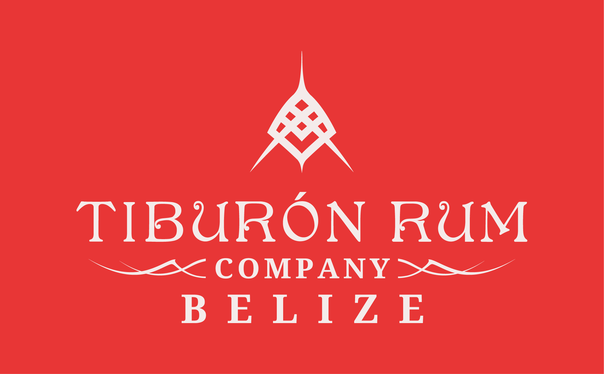 White logo for Tiburón Rum Company Belize on a red background, featuring a stylized nautical-themed crest.