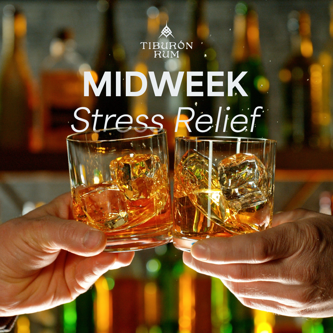 Two hands clinking glasses filled with amber rum and ice in front of a bar, with text reading 