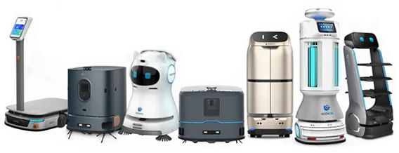 Several service robots lined up, varying in shape and size, against a white background.