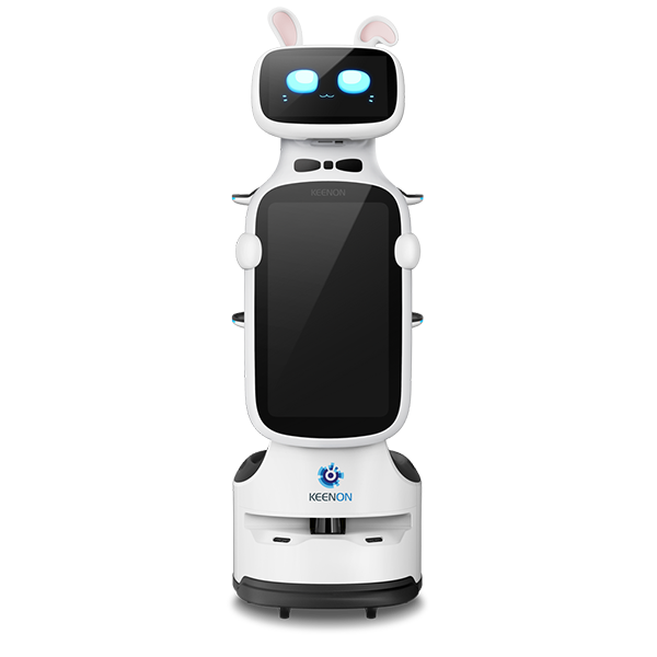 White service robot with shelves, blue eyes on screen, standing on a gray platform in front of a gray background.