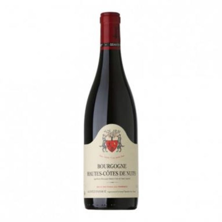 A bottle of bourgogne wine with a red cap