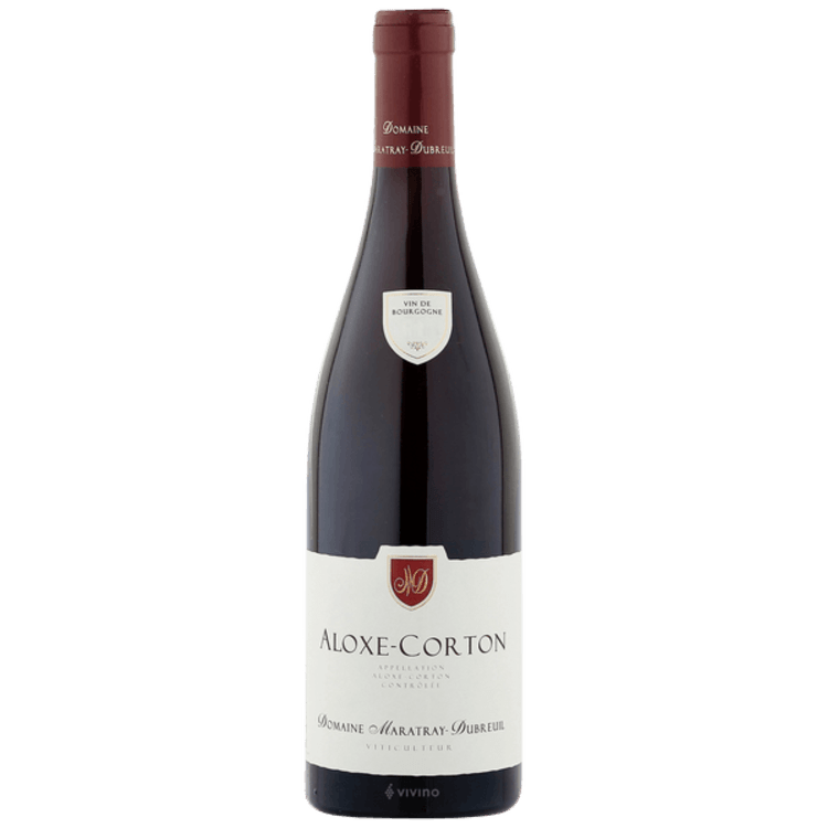 A bottle of aloxe corton wine on a white background