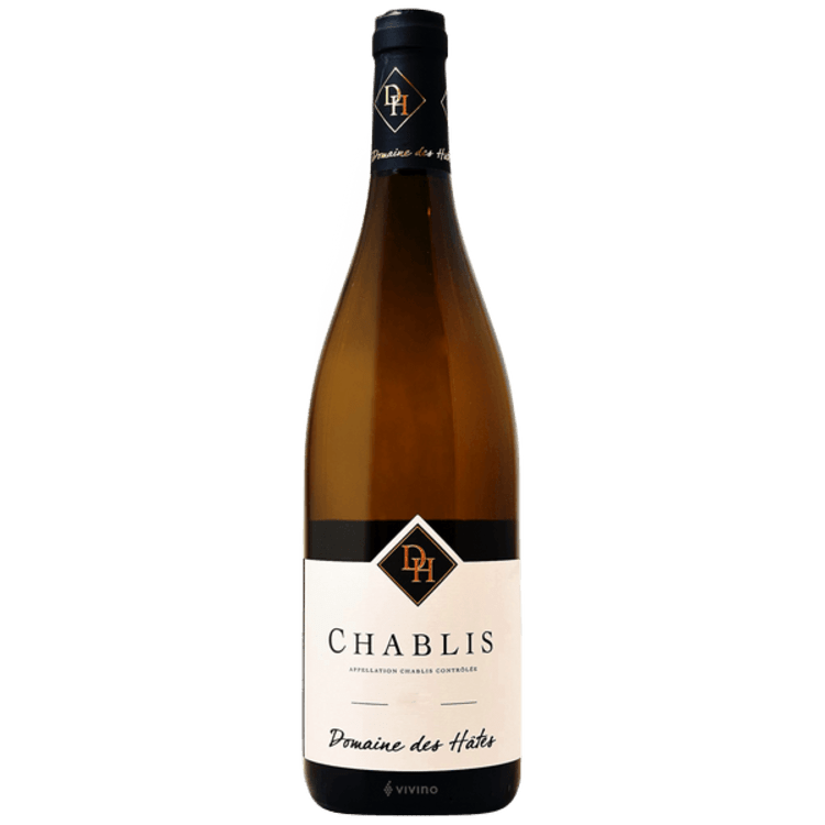 A bottle of chablis wine on a white background