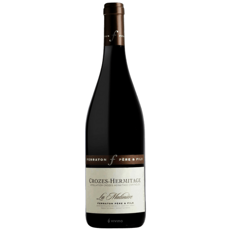 A bottle of crozes-hermitage wine on a white background