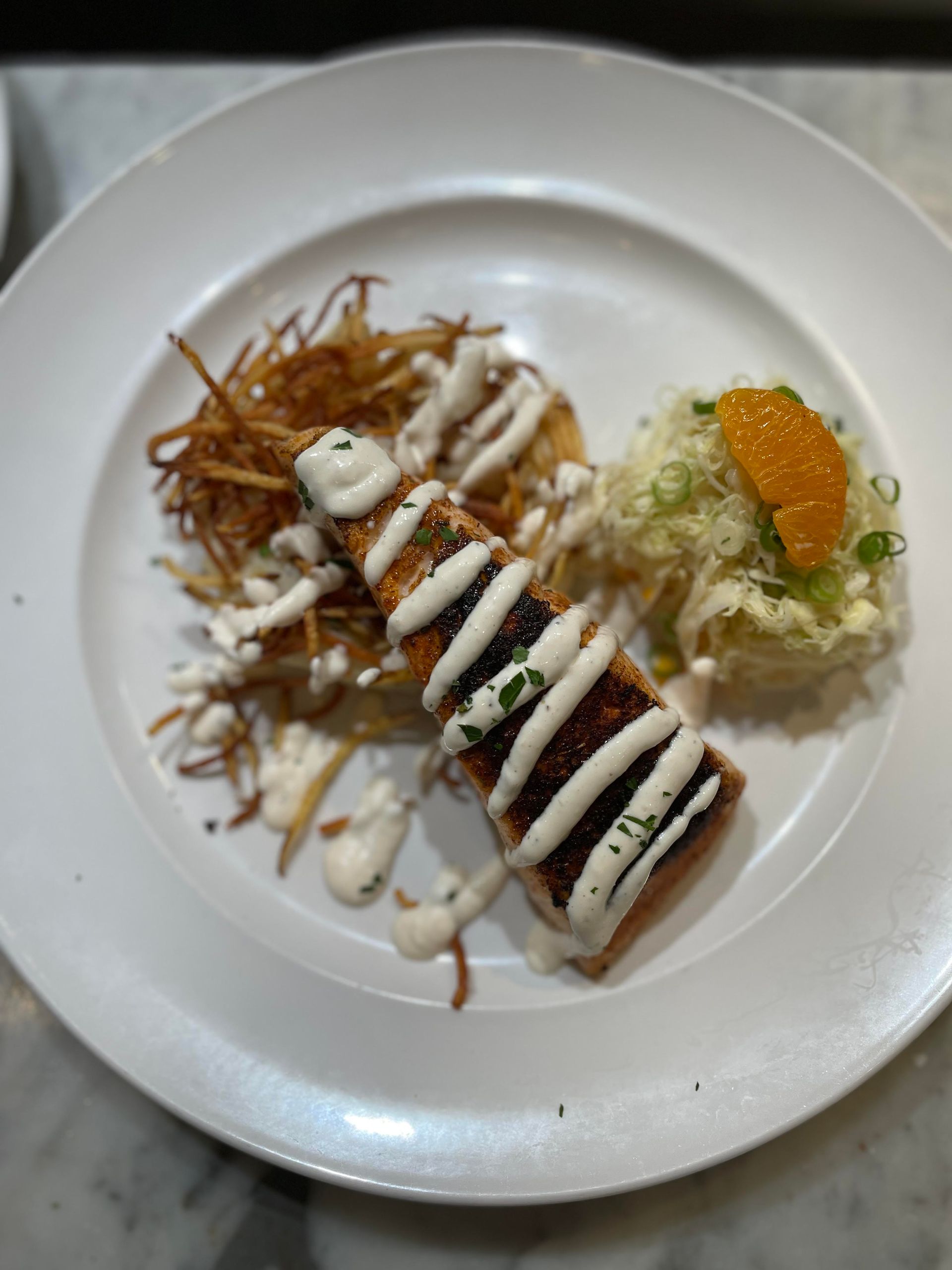 A close up of a plate of food on a table