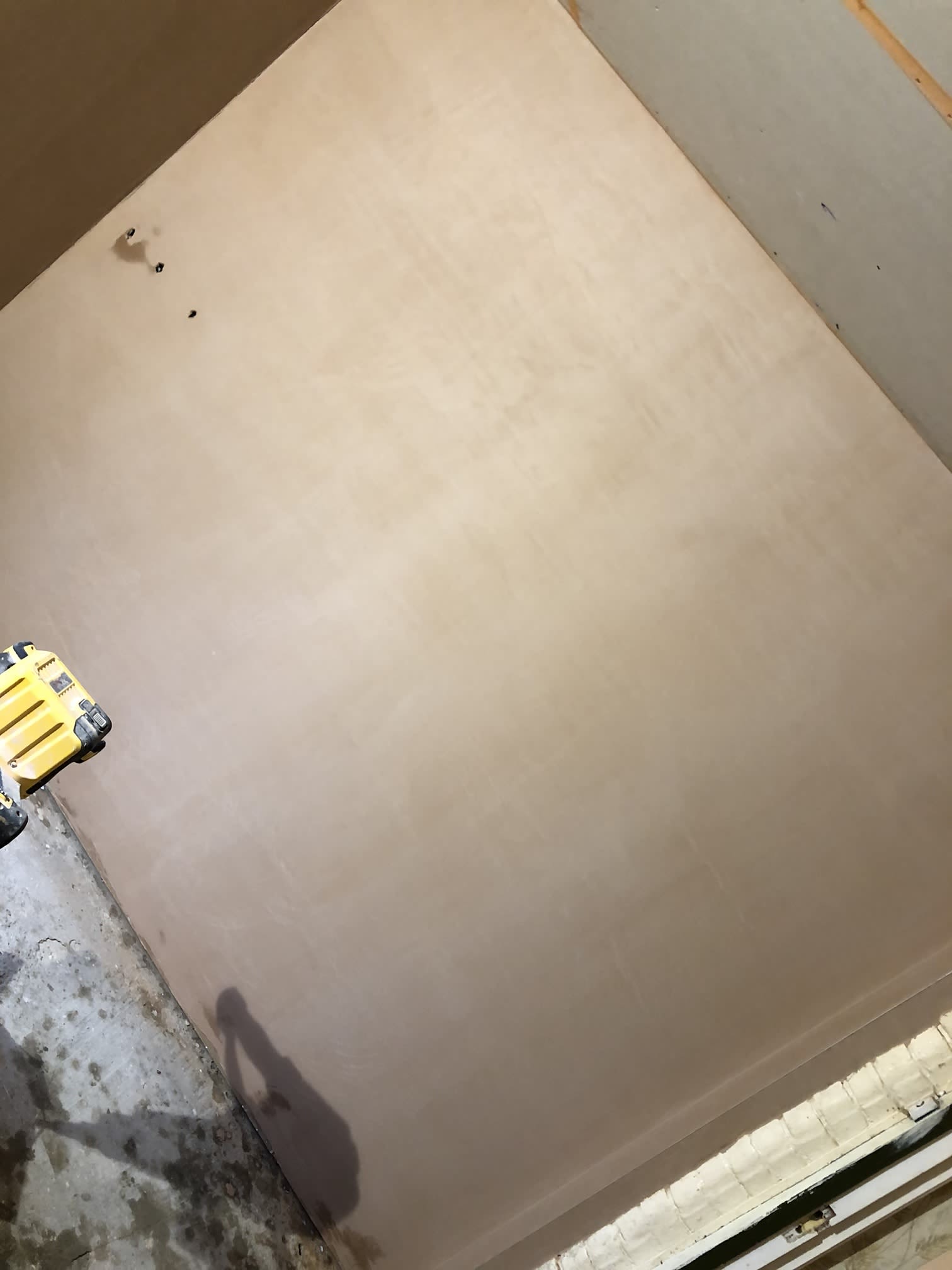 freshly plastered wall, angled shot