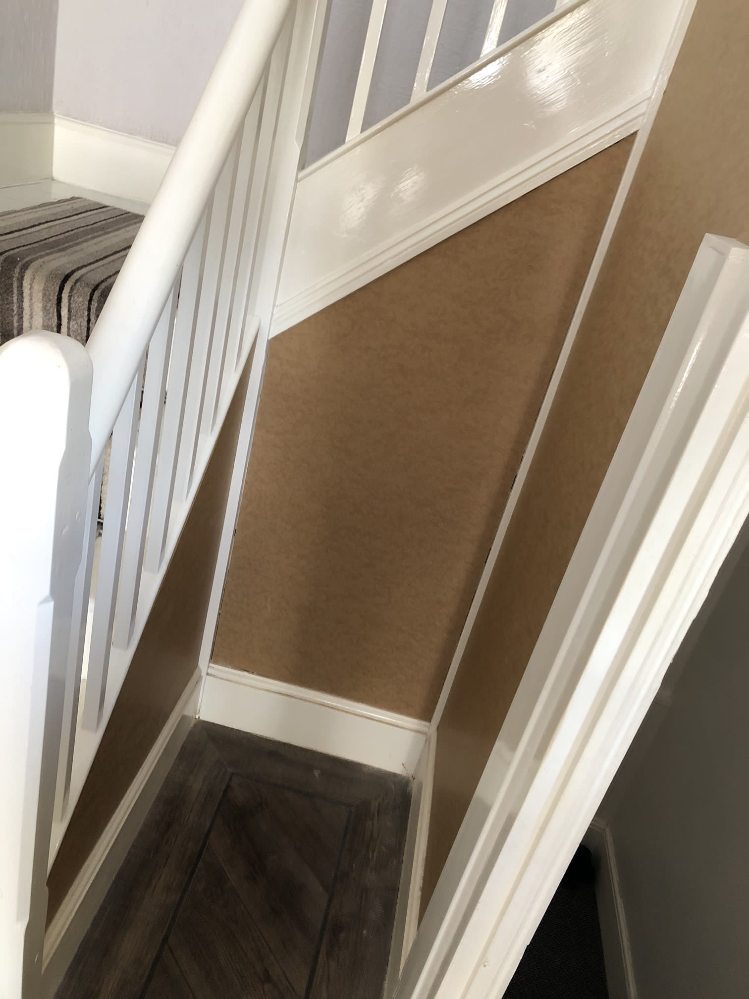 Under the stairs plastering