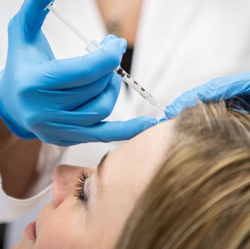 A botox procedure being done on a patient