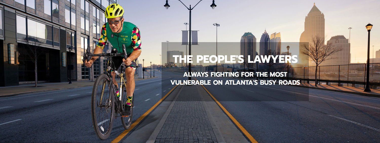 Cyclist on city road with