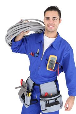 Young electrician smiling