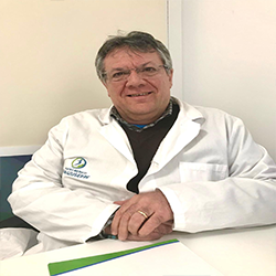 Logo del Centro Medico San Giuseppe: una figura all'interno di un cerchio blu e verde, con testo sottostante.