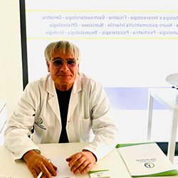 Logo del Centro Medico San Giuseppe: una figura all'interno di un cerchio blu e verde, con testo sottostante.